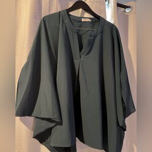 Never worn! Dark blue/green dress shirt with bubble sleeves. Size M/L